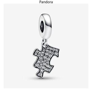 Authentic Pandora Sparkling Puzzle Piece Dangle Charm.
